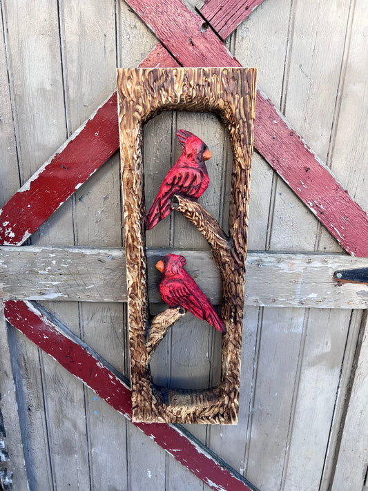 Chainsaw carved cardinals . Rustic Wall decor