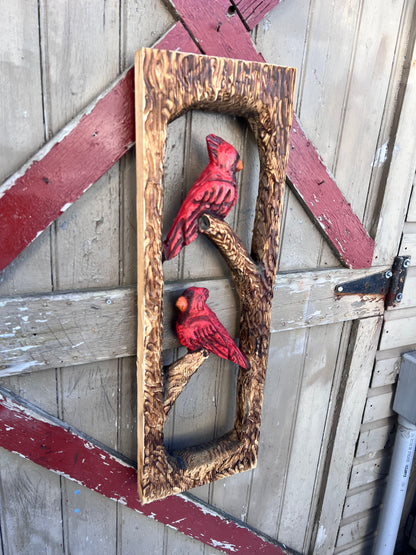 Chainsaw carved cardinals . Rustic Wall decor